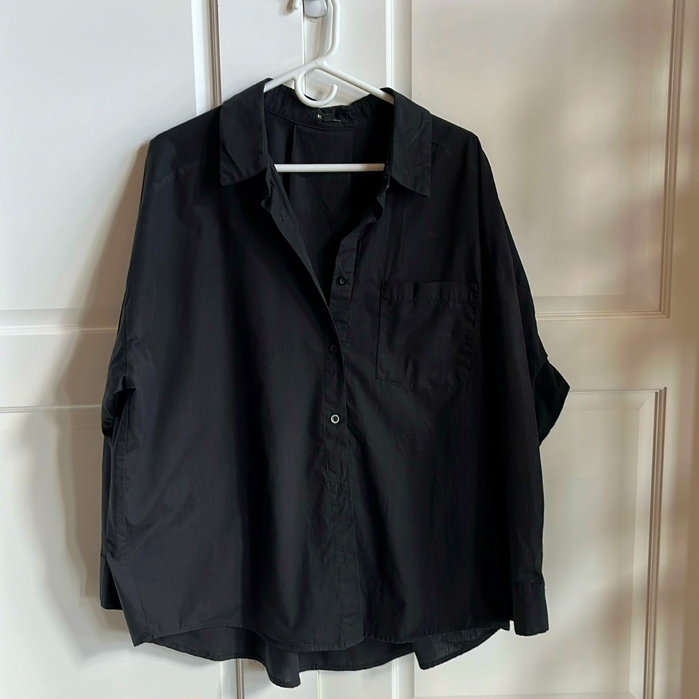 Button down black baggy fit shirt.